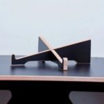 Minimalist laptop stand for desk